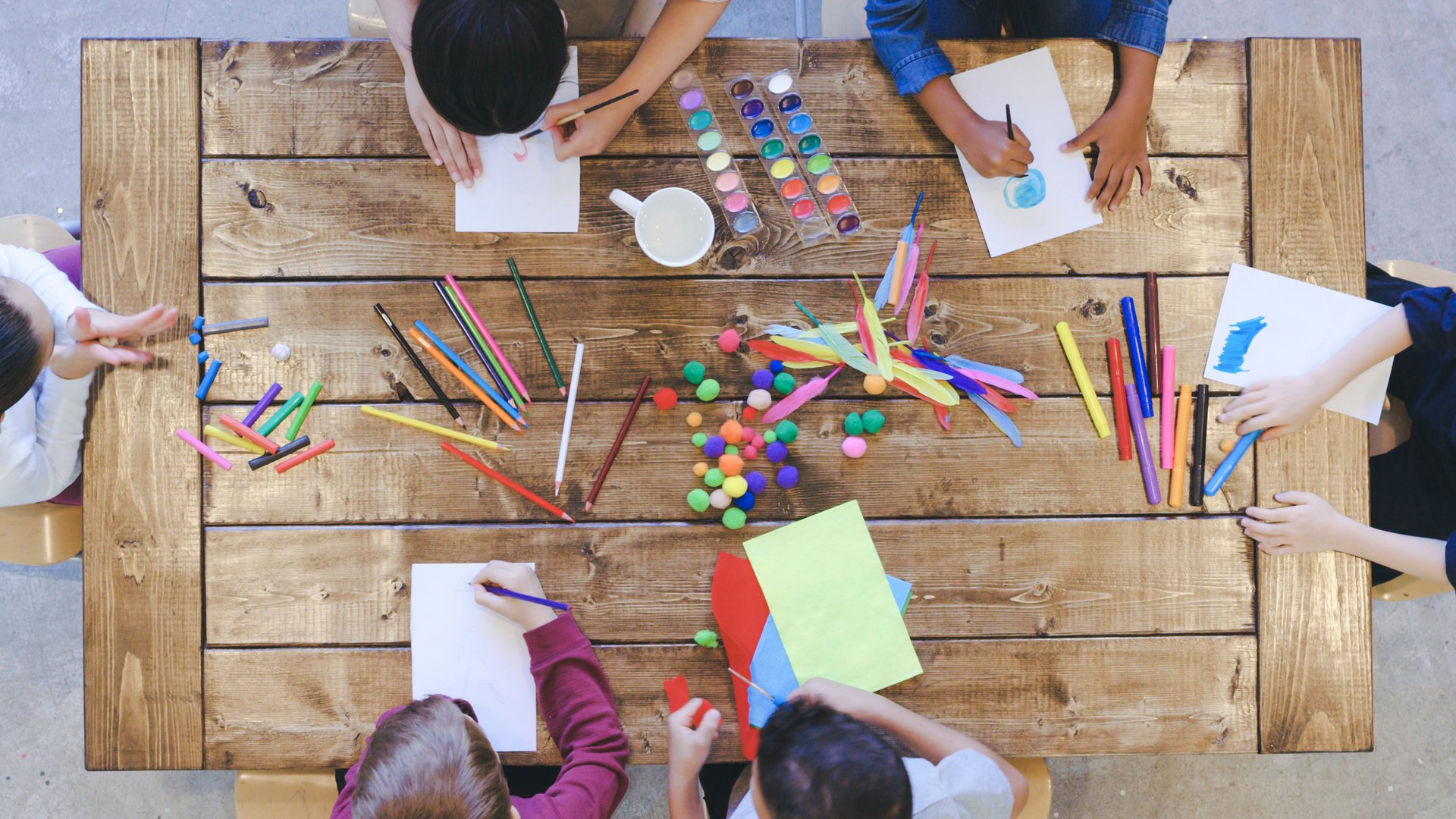 Aerial view of kids doing arts and crafts